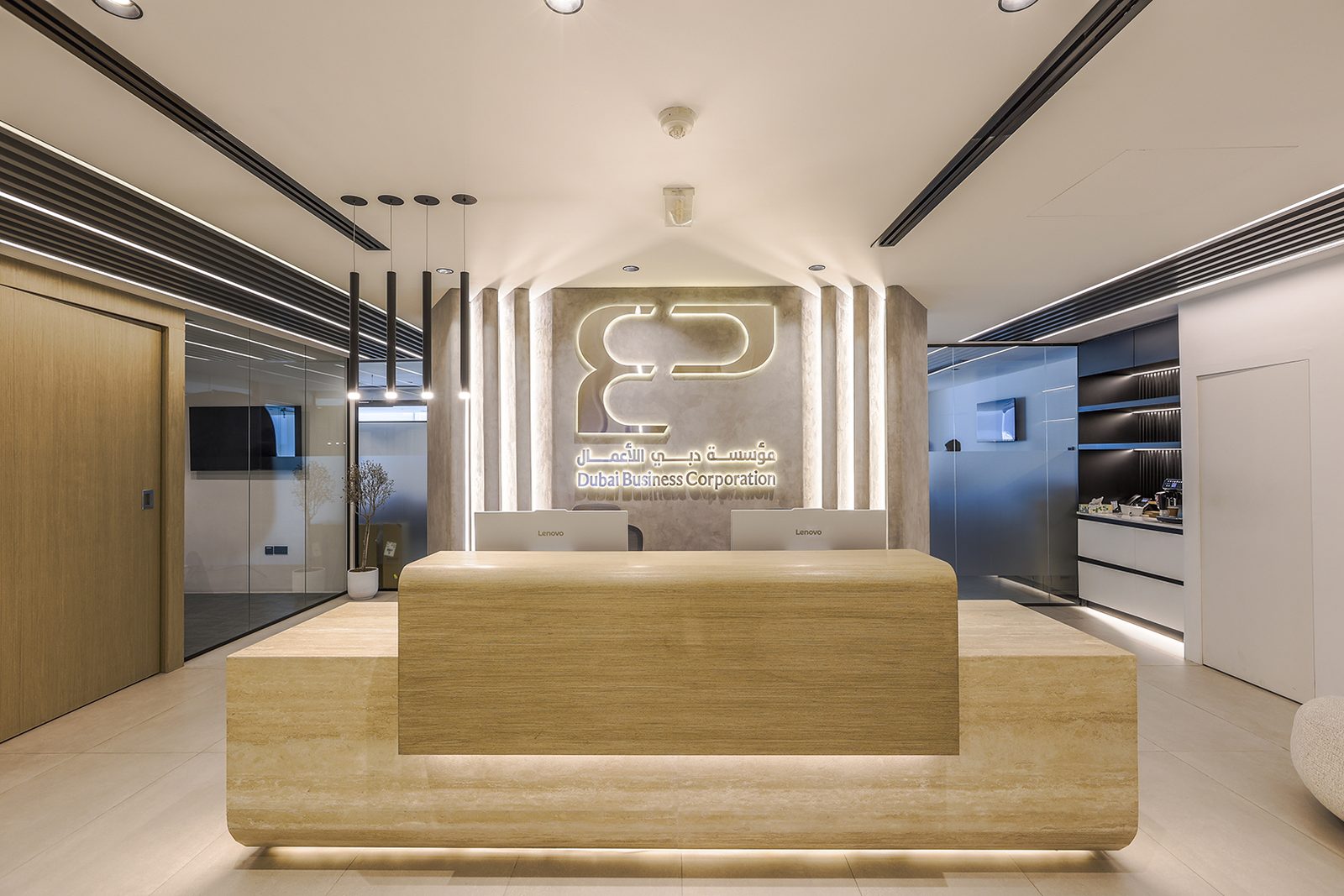 The reception of Dubai Business Corporation, Office 3402, Burj Al Salam, with the lit DBC mark on the wall